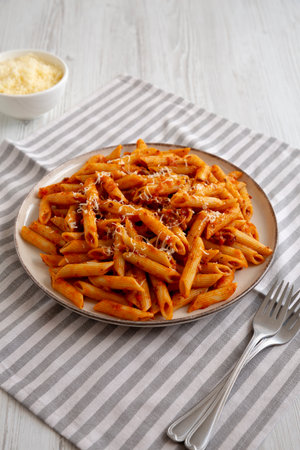 Homemade Pasta Bolognese with Cheese on a Plate, side view.の写真素材