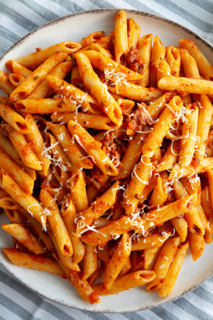 Homemade Pasta Bolognese with Cheese on a Plate, top view.の写真素材