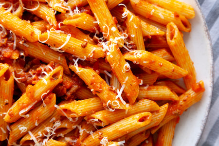 Homemade Pasta Bolognese with Cheese on a Plate, top view.の写真素材