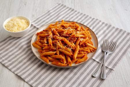 Homemade Pasta Bolognese with Cheese on a Plate, side view.の写真素材