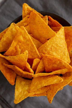 Crunchy Nacho BBQ Tortilla Chips in a Bowl, top view.の写真素材
