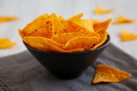 Crunchy Nacho BBQ Tortilla Chips in a Bowl, low angle view.の写真素材