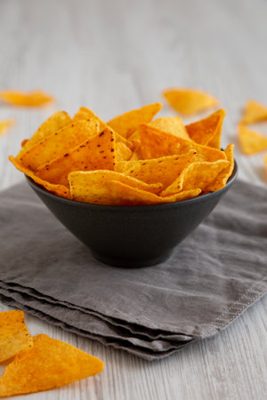Crunchy Nacho BBQ Tortilla Chips in a Bowl, low angle view.の写真素材