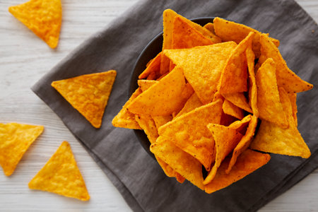 Crunchy Nacho BBQ Tortilla Chips in a Bowl, top view.の写真素材