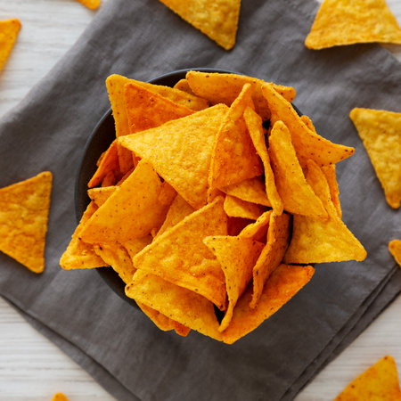 Crunchy Nacho BBQ Tortilla Chips in a Bowl, top view.の写真素材
