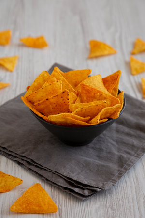 Crunchy Nacho BBQ Tortilla Chips in a Bowl, low angle view.の写真素材