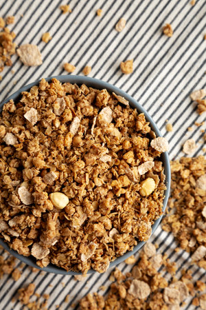 Healthy Homemade Toasted Muesli with Nuts in a Bowl, top view.