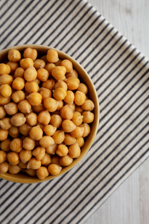 Organic Raw Canned Chickpeas in a Bowl, top view. Copy space.の写真素材
