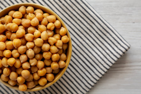 Organic Raw Canned Chickpeas in a Bowl, top view. Copy space.の写真素材