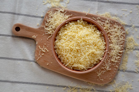 Organic Grated Cheese Mix in a Bowl, top view.