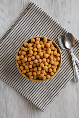 Organic Raw Canned Chickpeas in a Bowl, top view. Flat lay, overhead.の写真素材