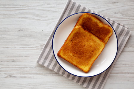 Homemade Cinnamon Toast with Butter, top view. Copy space.
