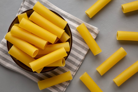 Raw Italian Cannelloni Pasta in a Bowl, top view.の写真素材