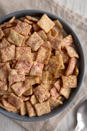 Sweet Breakfast Cereal with Whole Milk in a Bowl, top view.