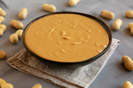 Creamy Peanut Butter in a Bowl, side view.