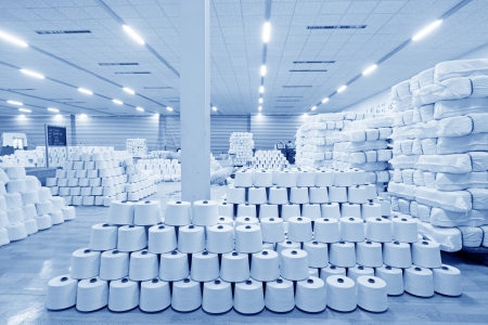 Luannan, November 20, 2012  Piles of spindles stacked together in a warehouse in the Zeao spinning company, in November 20, 2012, Luannan County, china  This is the largest of a modern spinning company in Hebei province  のeditorial素材