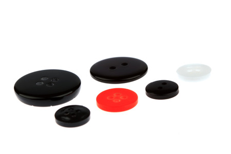 plastic material button on a white background
