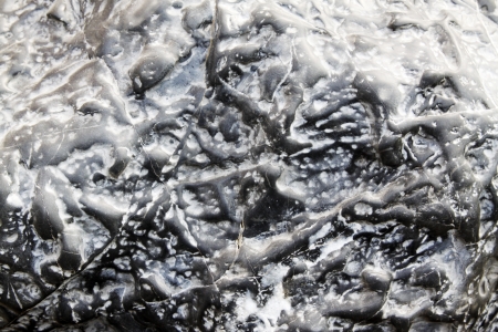 gray rock texture background, closeup of photoの写真素材