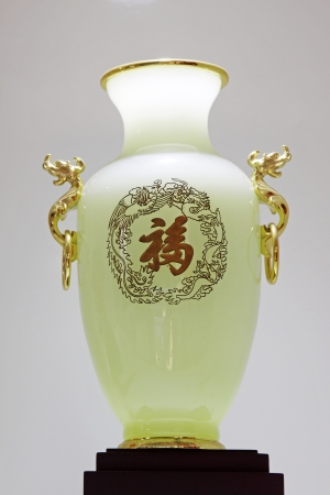 Jade bottle sculpture on a white backgroundのeditorial素材