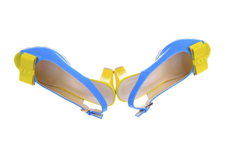 beautiful Women's high-heeled color sandals on a white 