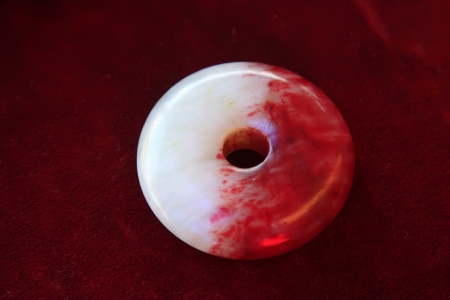 polished jade products in a shop, closeup of photo の写真素材