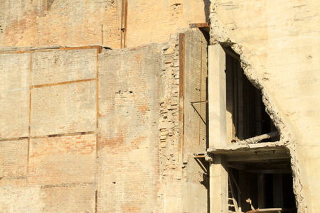 broken danger wall in a workshop, closeup of photoの写真素材