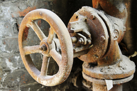 abandoned dirty pipe valve in a factory