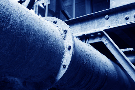 rusty metal pipes, in a dirty abandoned workshop の写真素材