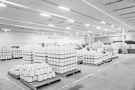 LUANNAN COUNTY - DECEMBER 20: The cotton reel thread piled up together in a production workshop, in the ZeAo spinning LTD., on December 20, 2013, Luannan county, hebei province, China. 
のeditorial素材