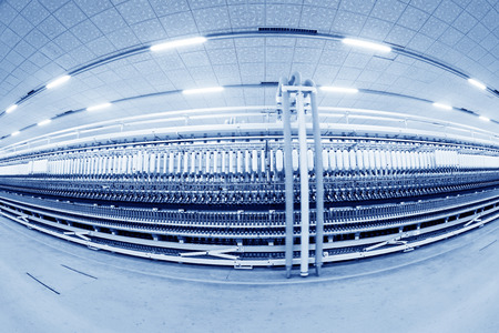 LUANNAN COUNTY - DECEMBER 20: The spinning machinery and spindles in a production workshop, in the ZeAo spinning LTD., on December 20, 2013, Luannan county, hebei province, China. 
のeditorial素材