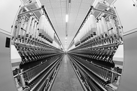 LUANNAN COUNTY - DECEMBER 20: The spinning machinery and spindles in a production workshop, in the ZeAo spinning LTD., on December 20, 2013, Luannan county, hebei province, China. 
のeditorial素材