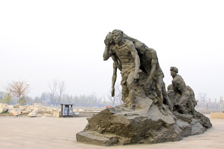 TANGSHAN CITY - NOVEMBER 16: The seismic characters statue in the Tangshan earthquake ruins park, on november 16, 2013, tangshan city, hebei province, China. のeditorial素材