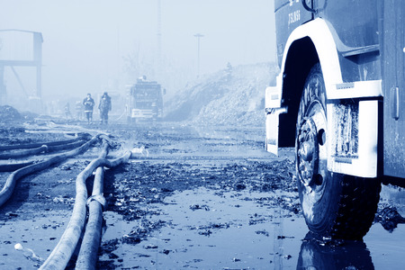 TANGSHAN - NOVEMBER 20: The prepare to leave the scene of the fire fighting vehicles and personnel after the fire, November 20, 2013, tangshan city, hebei province, China. のeditorial素材