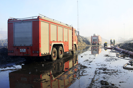 TANGSHAN - NOVEMBER 20: The prepare to leave the scene of the fire fighting vehicles and personnel...