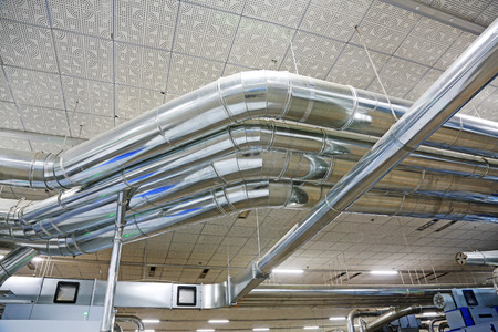 LUANNAN COUNTY - DECEMBER 20: The metal pipes in a production workshop, in the ZeAo spinning LTD., on December 20, 2013, Luannan county, hebei province, China. のeditorial素材