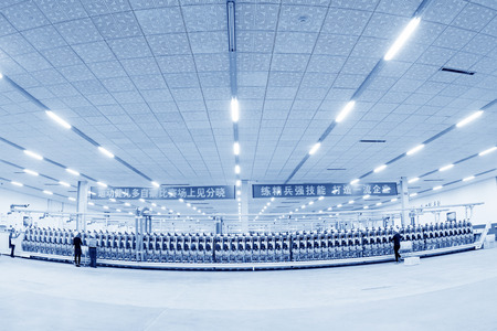 LUANNAN COUNTY - DECEMBER 20: The workers were working in tension in a production workshop, in the ZeAo spinning LTD., on December 20, 2013, Luannan county, hebei province, China. 
のeditorial素材