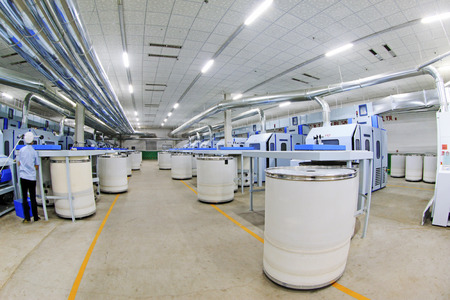 LUANNAN COUNTY - DECEMBER 20: The combed cotton production line and pipes in the ZeAo spinning LTD., on December 20, 2013, Luannan county, hebei province, China. のeditorial素材