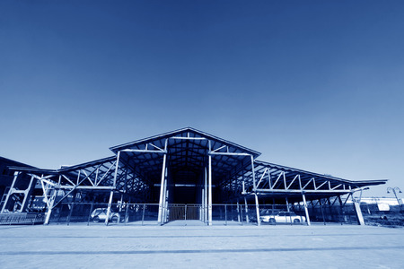 TANGSHAN - NOVEMBER 4: The timberwork building under the blue sky in the Qixin cement plant on...