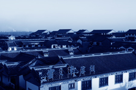 LUAN COUNTY - NOVEMBER 10: The words  Yunnan inn on the roof of the antique buildings in the Luan...