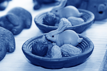 Little rabbit ceramic furnishing articles in a shopの写真素材