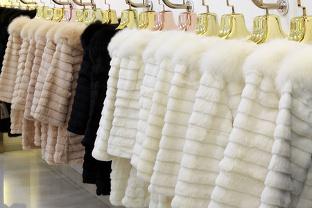 TANGSHAN CITY - NOVEMBER 16: The Fine fur clothing on hangers in a store, on november 16, 2013,...