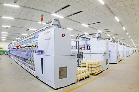 LUANNAN COUNTY - DECEMBER 20: The spinning machinery and cotton yarn in a production workshop, in the ZeAo spinning LTD., on December 20, 2013, Luannan county, hebei province, China. 
のeditorial素材