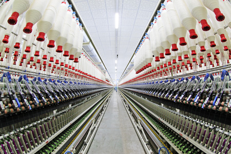 LUANNAN COUNTY - DECEMBER 20: The spinning machinery and spindles in a production workshop, in the ZeAo spinning LTD., on December 20, 2013, Luannan county, hebei province, China. 
のeditorial素材