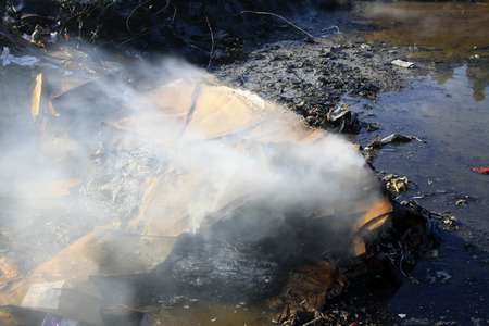 TANGSHAN - NOVEMBER 20: The wet cardboard  not fully burning in the scene of the fire, November 20, 2013, tangshan city, hebei province, China. 
のeditorial素材