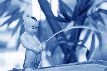 Art ceramics of naughty boy の写真素材