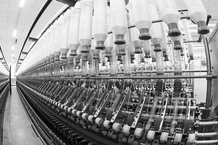 LUANNAN COUNTY - DECEMBER 20: The spinning machinery and spindles in a production workshop, in the ZeAo spinning LTD., on December 20, 2013, Luannan county, hebei province, China. 
のeditorial素材