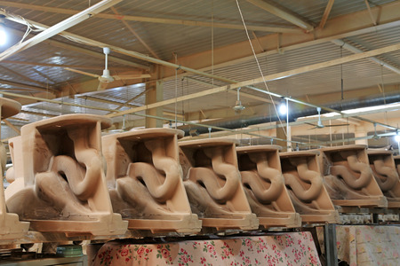 LUANNAN COUNTY - JANUARY 5: The ceramic semi-finished products parts on the iron frame, in the ZhongTong Ceramics Co., Ltd. January 5, 2014, Luannan county, Hebei Province, China.のeditorial素材