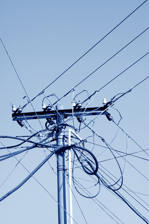 telegraph poles in the blue sky, closeup of photoの写真素材