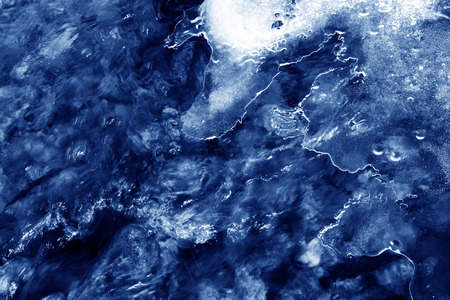 melting ice in the wild, closeup of photo