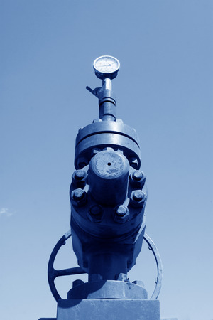 Oil pipe and pressure gauge, closeup of photoの写真素材